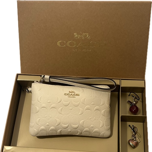 Coach Cream Wristlet with Charms in original box - Picture 1 of 6